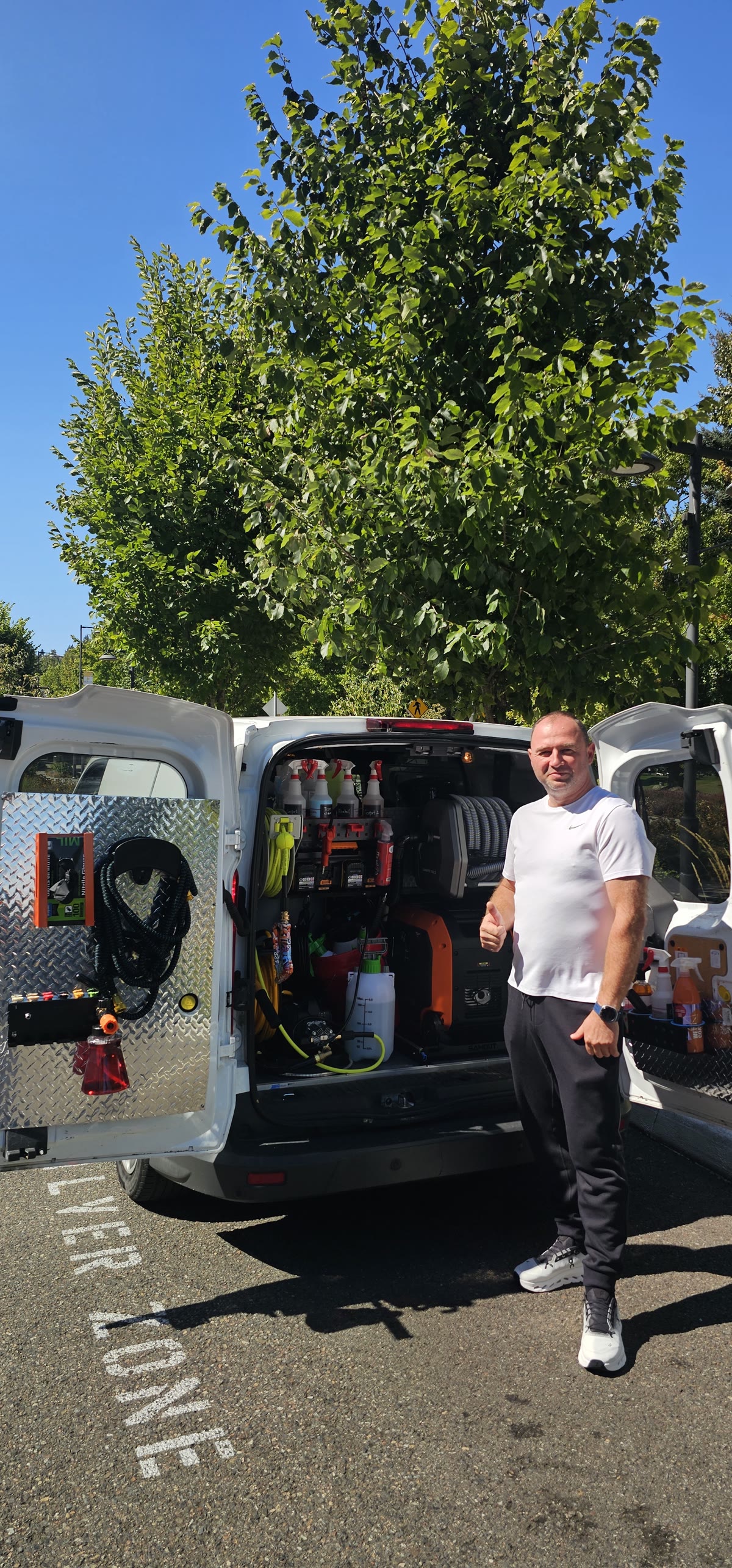 Mobile detailing van trunk with organized equipment
